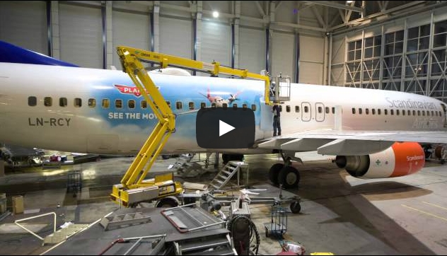 Timelapse of SAS plane getting striped with Disney “Planes” characters