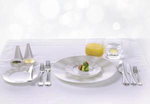 Etihad Airways_newdining concept_First-Class-table-setting-with-Nikko-fine-bone-china-and-cutlery-by-Studio-William
