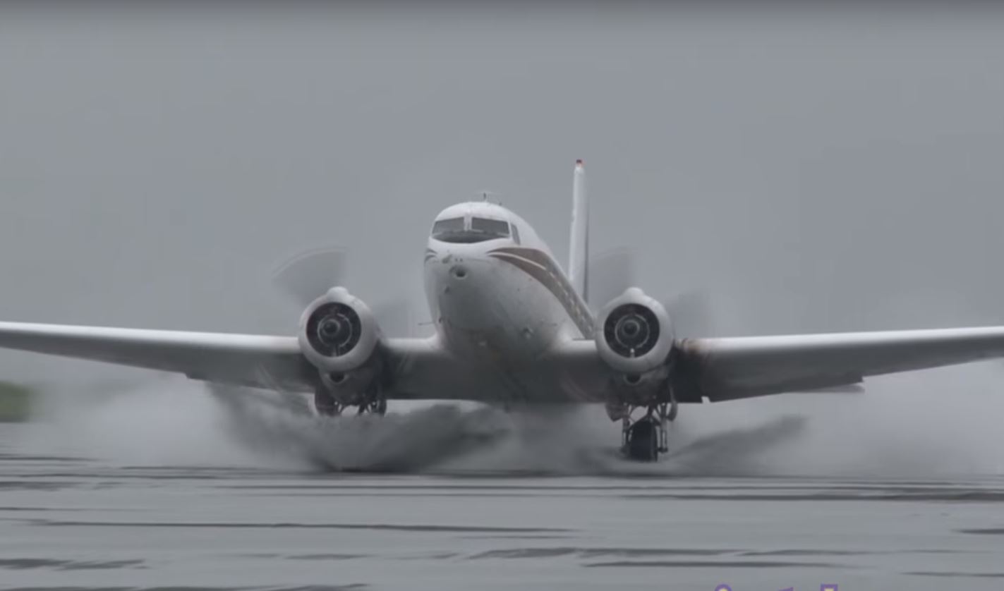 Trans Northern Aviation Douglas DC-3 landing on a wet beach