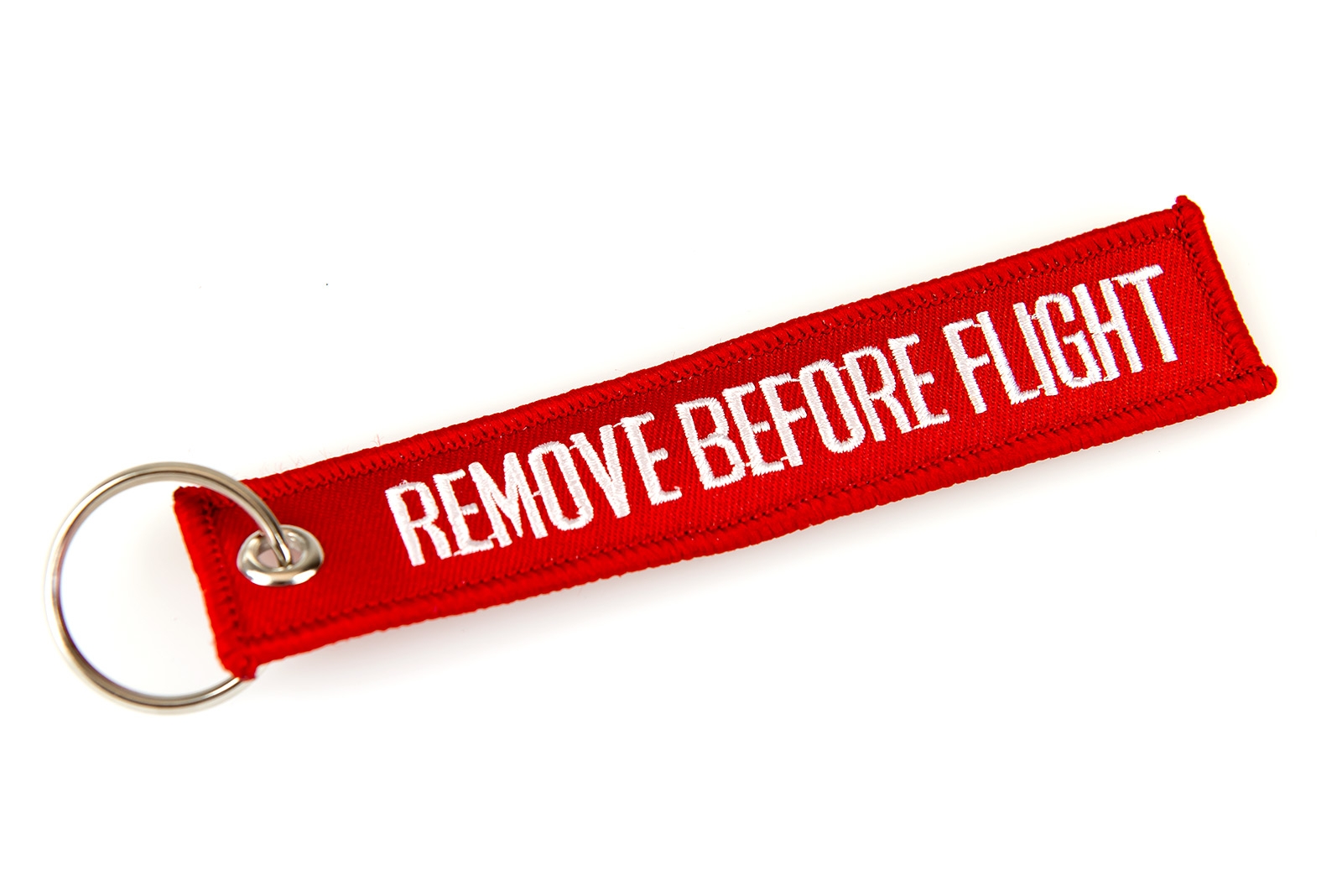 Remove before flight sign on an aircraft, Red remove before flight