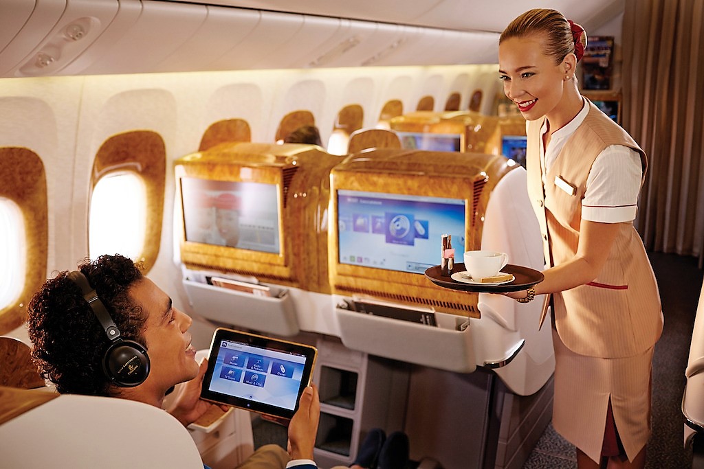 Emirates cabin crew use smartphones to take passengers’ meal orders