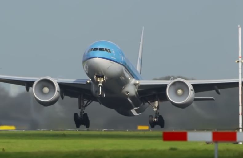 Why is there a white cloud in the airplane engine?